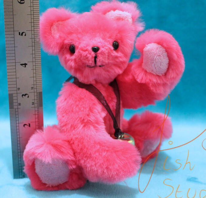 Tiny Pink Teddy A cute, jointed pink teddy sporting a bell necklace. This cutie is big enough to hug but small enough to travel. Made with luxury faux fur and minky fabrics. handmade in the UK by fishpish studios