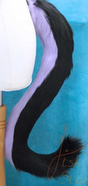 Fantasty Cat - Medium Length A longer style of cat tail reaching to about knee height on the average adult. The top part is black, the underside is lilac. The colours can be changed to suit your character's needs. Great for costumes, cosplay fursuits and larping