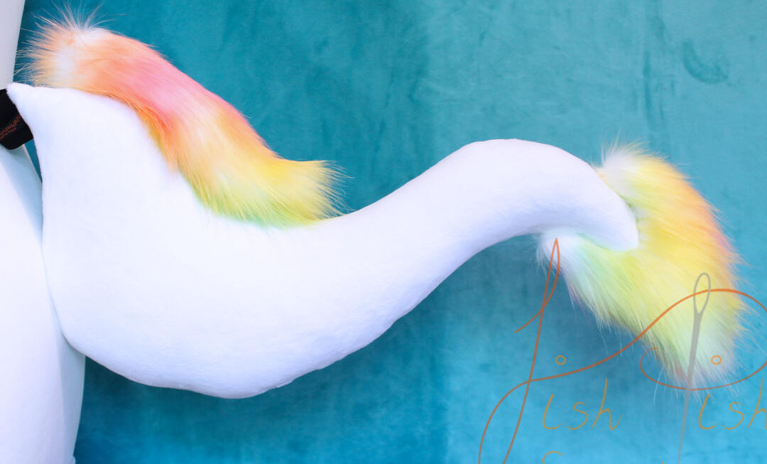 White and Rainbow Faux Eastern Dragon A 21 inch long, stick out eastern dragon styled tail in white and pale rainbow. this tail is designed for use on fursuits, larp and cosplay. Designed and made by fishpish studios