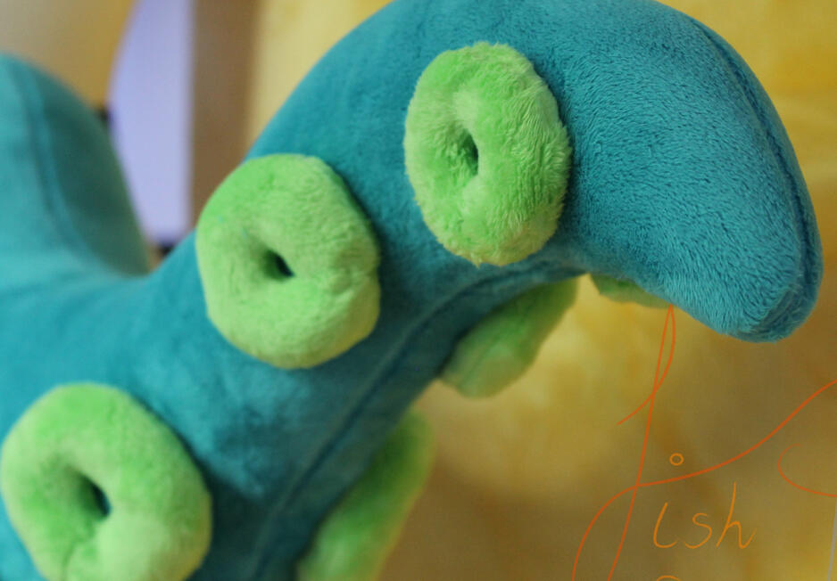 Octopus Tentacle Suckers Close Up A unique style of tail, this one sports a solid colour base with different coloured suckers. Different colour combinations are available via the store, but more complex version will need commissioning. Handmade in the UK by fishpish studios