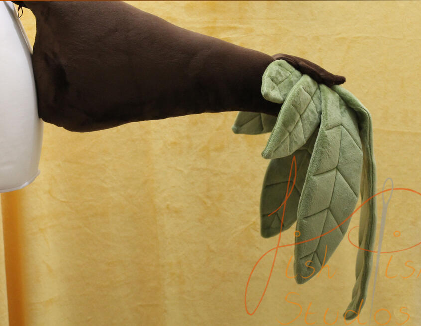 Pot Leaf Raptor Custom made pot leaf raptor tail consisting of seven leaves and a base brown tail. Made of minky fabric, the leaves hang like natural pot leaves at the end of the tail's tip. designed by the commissioner and made by fishpish studios