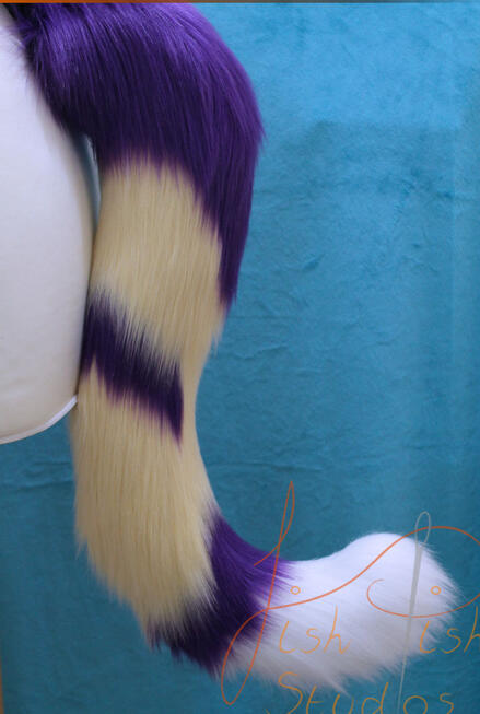 Cream and Purple Fantasy Cat Tail A commissioned piece, this fantasy cat tail is made with cream, purple and white luxury faux. is attaches with a belt, and is made for therian cosplay by fishpish studios