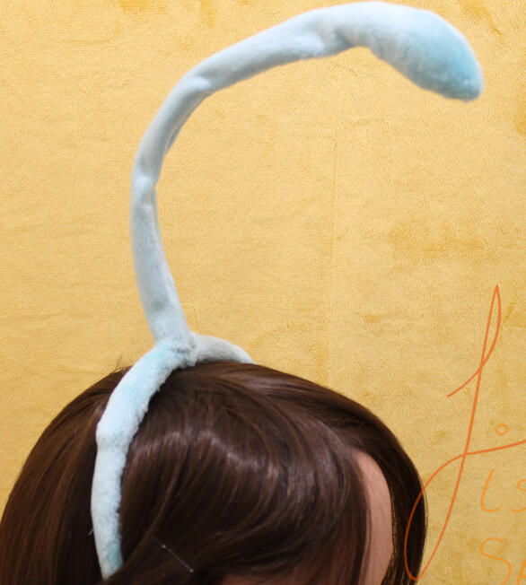 Created for a commission, this single antenna is for an alien costume. Balanced on a plastic headband, this wire-cored, soft plush antenna can be posed as needed. handmade in the UK by fishpish studios