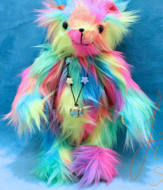 A cute, jointed rainbow teddy sporting a star necklace. This cutie is big enough to hug but small enough to travel. Made with luxury faux fur and minky fabrics. handmade in the UK by fishpish studios