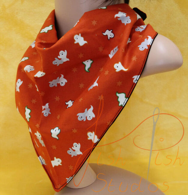 an XL bandana with little glowing ghosts on a red background. The fabrics are polycotton. The design is XL at 36 inches, making it a great fashion accessory or something to decorate your fursuit. handmade in the UK by fishpish studios