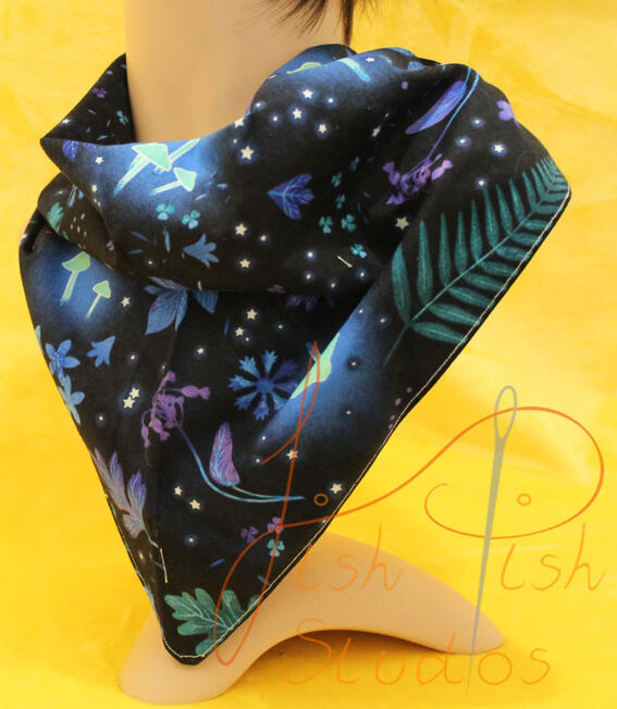 an XL bandana with glowing mushrooms and forest leaves on a black background. The fabrics are polycotton. The design is XL at 36 inches, making it a great fashion accessory or something to decorate your fursuit. handmade in the UK by fishpish studios