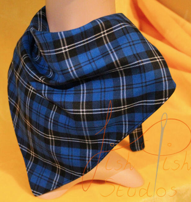 an XL bandana in a blue tartan colour. The fabrics are polycotton. The design is XL at 36 inches, making it a great fashion accessory or something to decorate your fursuit. handmade in the UK by fishpish studios
