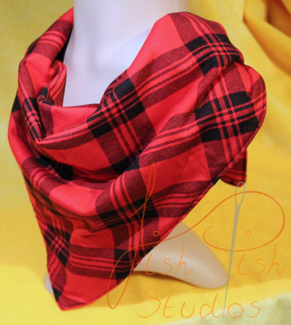 an XL bandana in a red tartan print. The fabrics are polycotton. The design is XL at 36 inches, making it a great fashion accessory or something to decorate your fursuit. handmade in the UK by fishpish studios